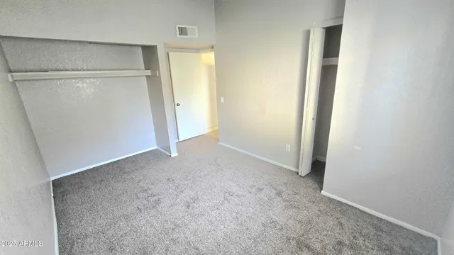 a view of balcony with wooden floor
