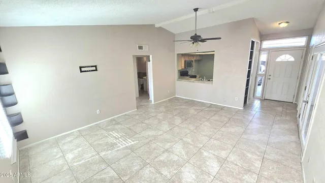 a view of a hallway with a chandelier