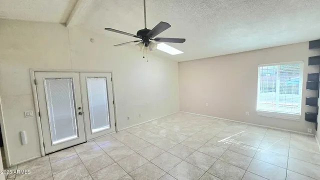 a kitchen with a sink and a stove top oven