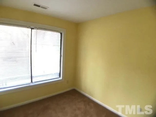 a view of a room with a window