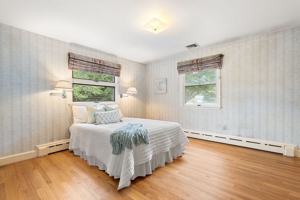 50 Tomahawk Road Arlington, MA 02474 - Photo 24 of 41 a bedroom with a bed and window