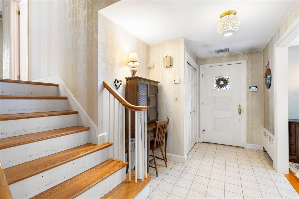 50 Tomahawk Road Arlington, MA 02474 - Photo 4 of 41 a view of entryway with furniture and a window