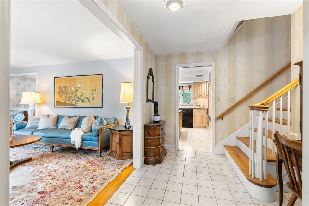50 Tomahawk Road Arlington, MA 02474 - Photo 5 of 41 a living room with furniture and a rug
