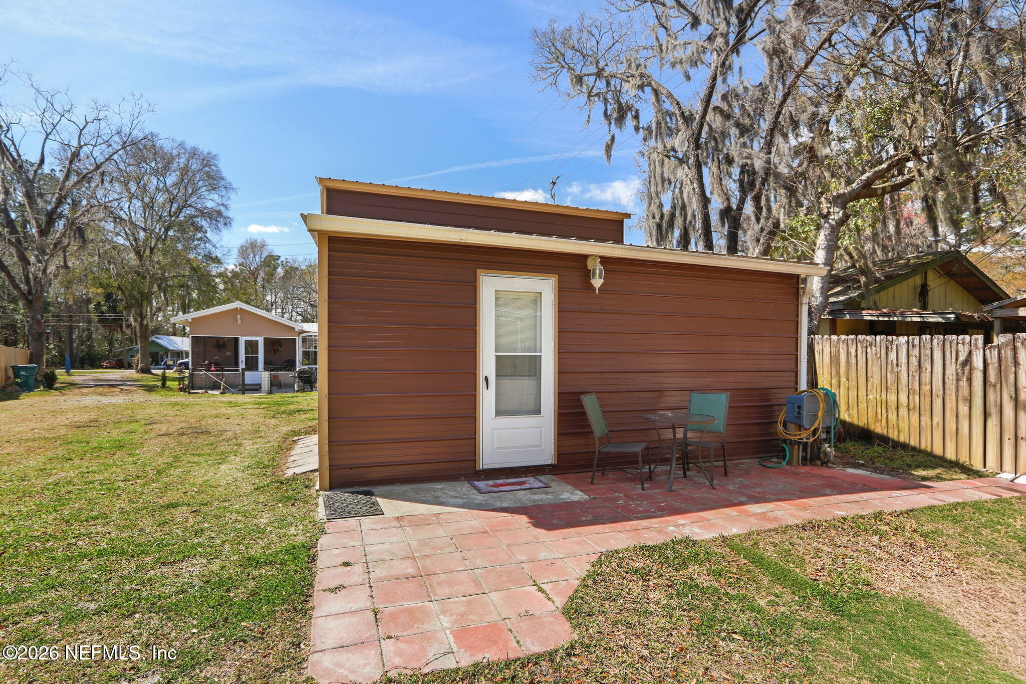 85930 North Harts Road Yulee, FL 32097 - Photo 27 of 50 a front view of a house with a yard