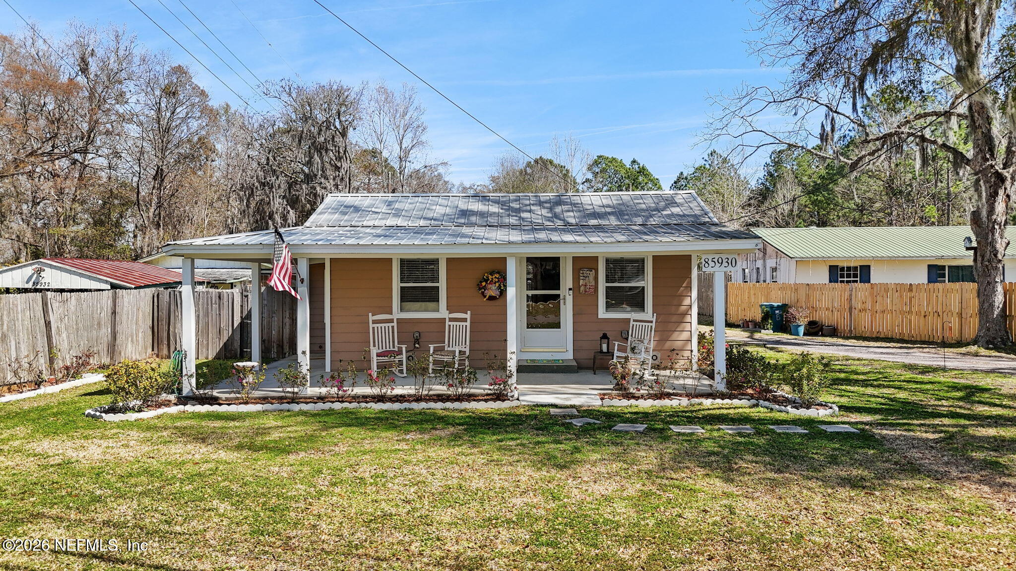 85930 North Harts Road Yulee, FL 32097 - Photo 28 of 50 a view of a house with backyard porch and sitting area