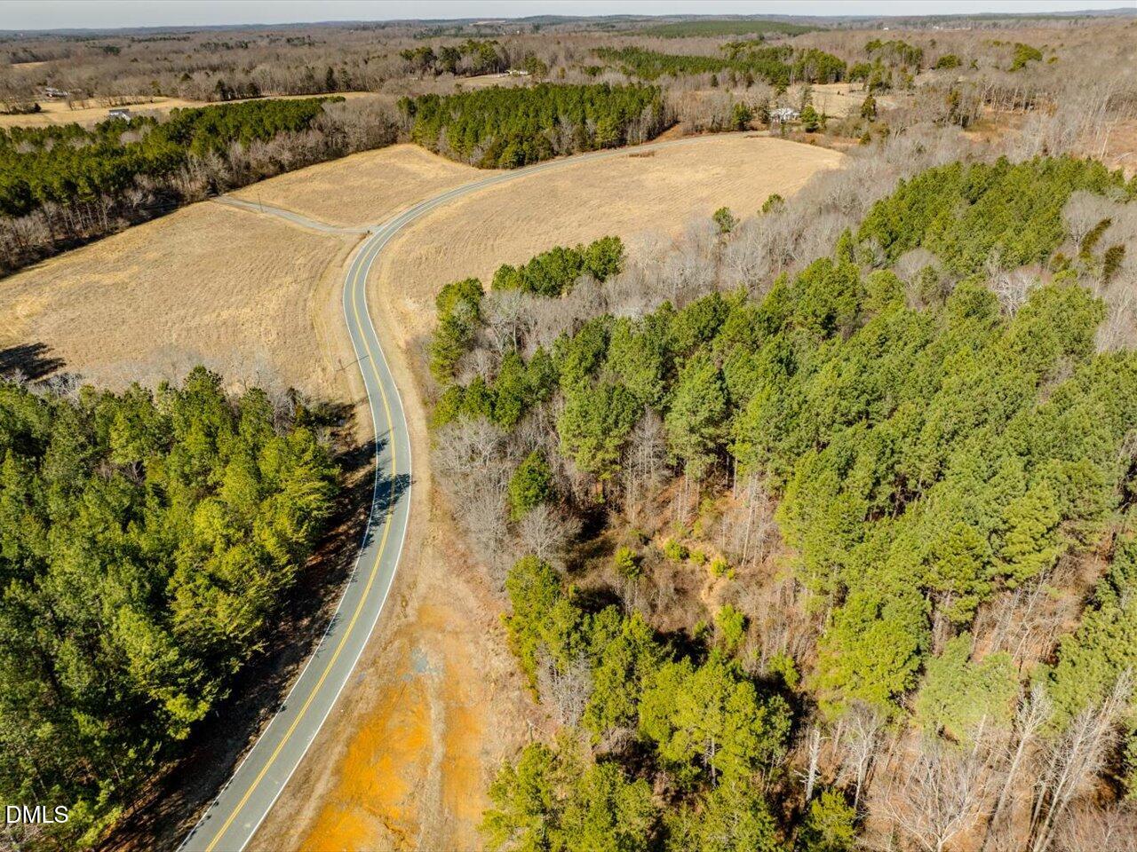 0 Mark Willett Road Bear Creek, NC 27207 - Photo 24 of 28 an aerial view of residential houses with outdoor space