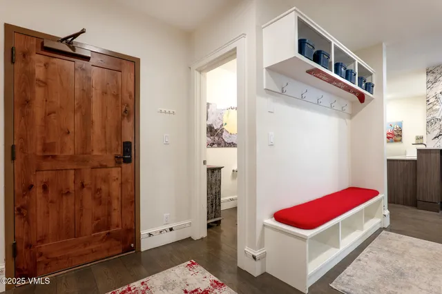 a kitchen with stainless steel appliances a refrigerator and a sink
