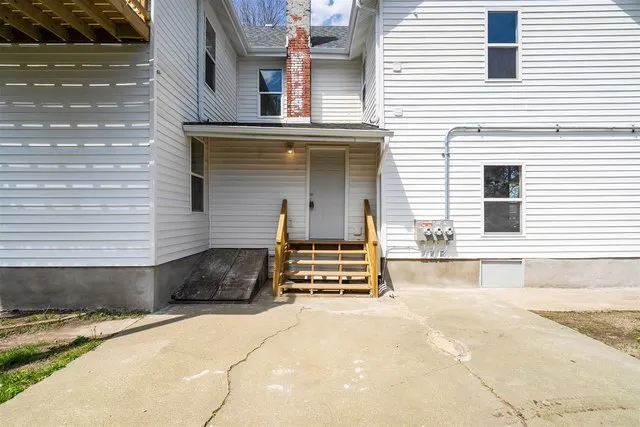 a front view of a house with a garage