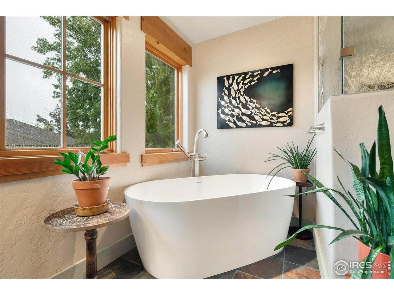 960 Ridge W Drive Windsor, CO 80550 - Photo 23 of 50 a white bath tub sitting in a bathroom