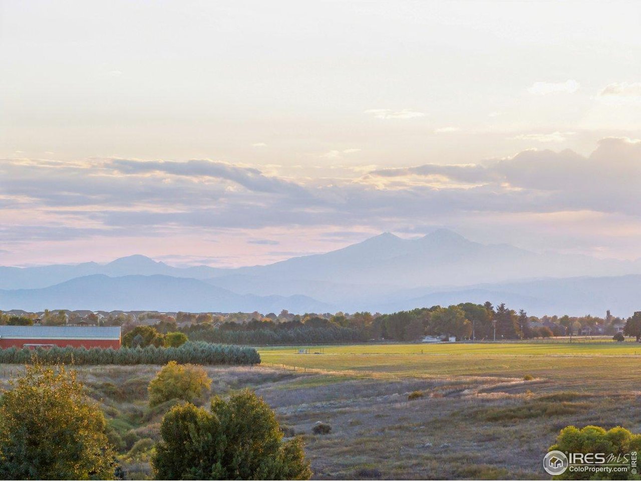 960 Ridge W Drive Windsor, CO 80550 - Photo 41 of 50 a view of an ocean and a mountain