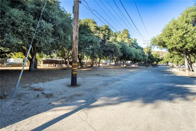 a view of road with trees