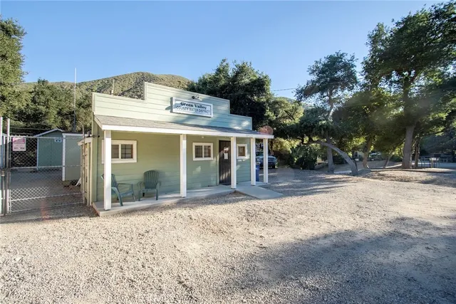 a view of a house with a park