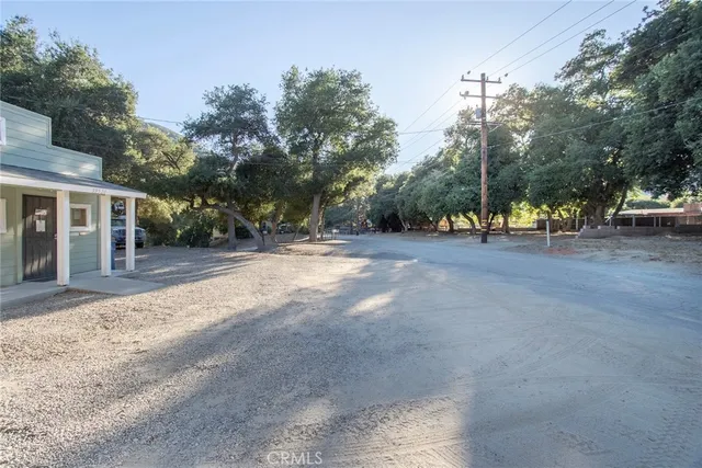 an aerial view of residential house with outdoor space
