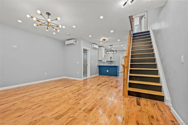 a view of a livingroom with a staircase