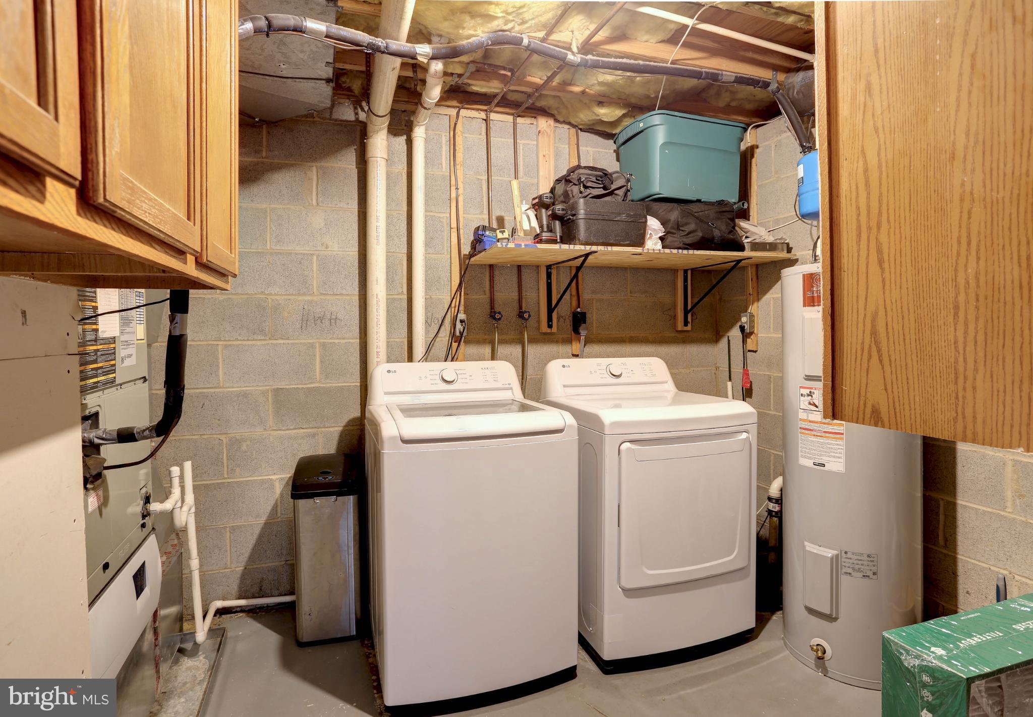 1159 Greenhill Road Arnold, MD 21012 - Photo 30 of 41 Functional laundry space with ample storage.