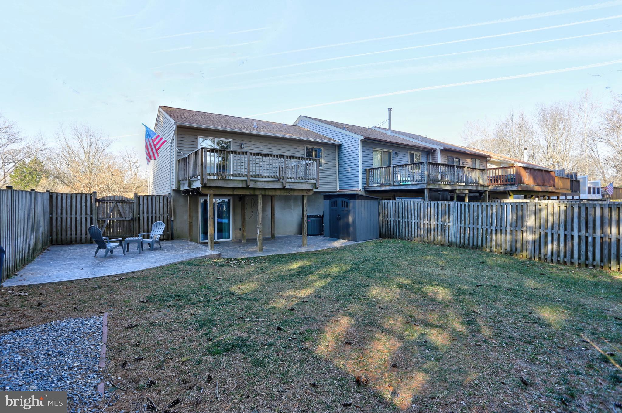 1159 Greenhill Road Arnold, MD 21012 - Photo 33 of 41 Charming backyard with deck and flag.