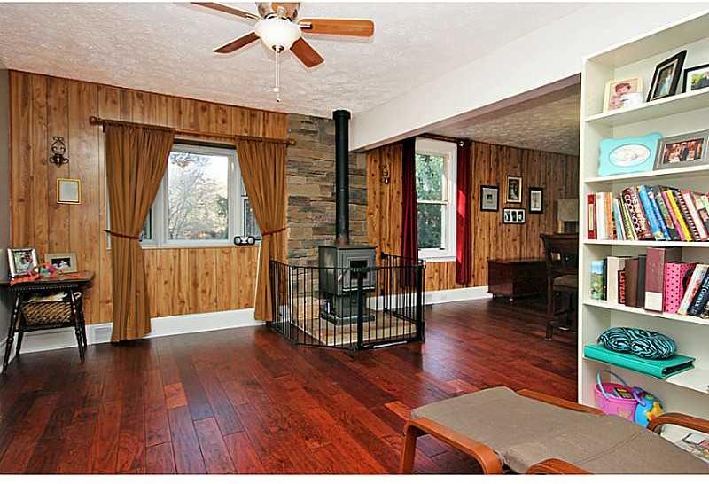 308 Marzolf Road Pittsburgh, PA 15209 - Photo 7 of 25 Living Room. Living room/Dining room combo with wood burning stove