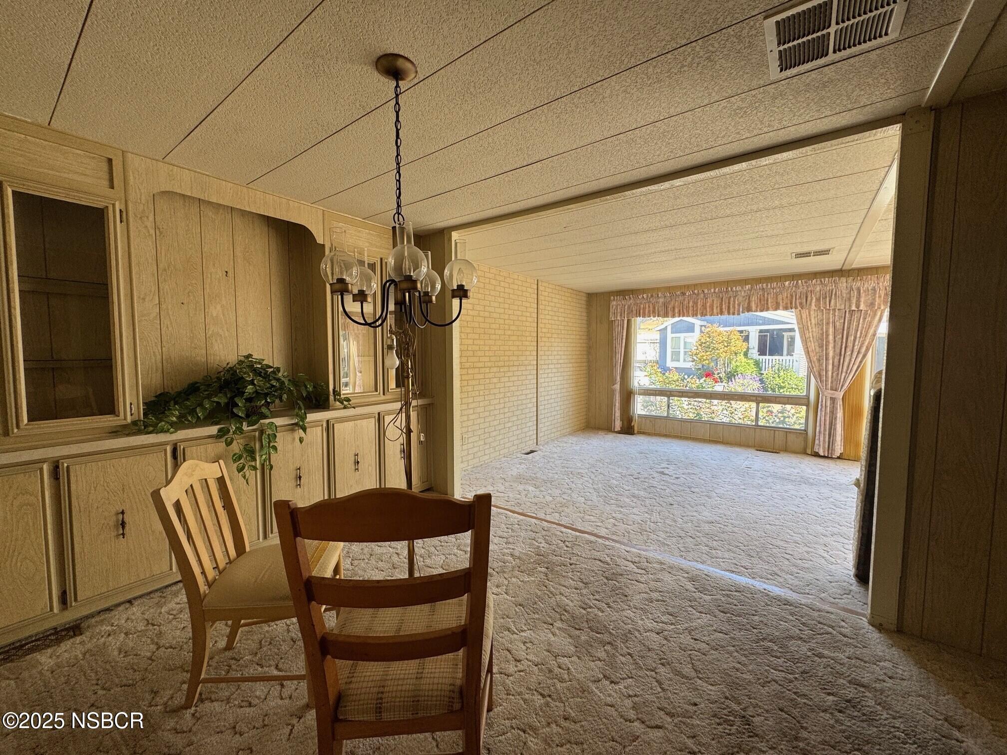 22 Via Del Sol Solvang, CA 93463 - Photo 8 of 16 a dining room with furniture and window
