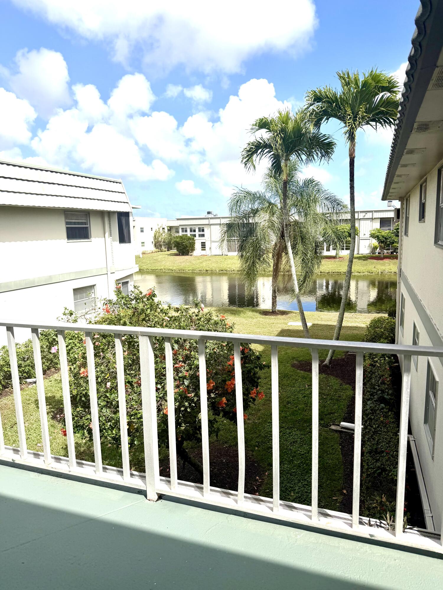 a view of a balcony with lake view