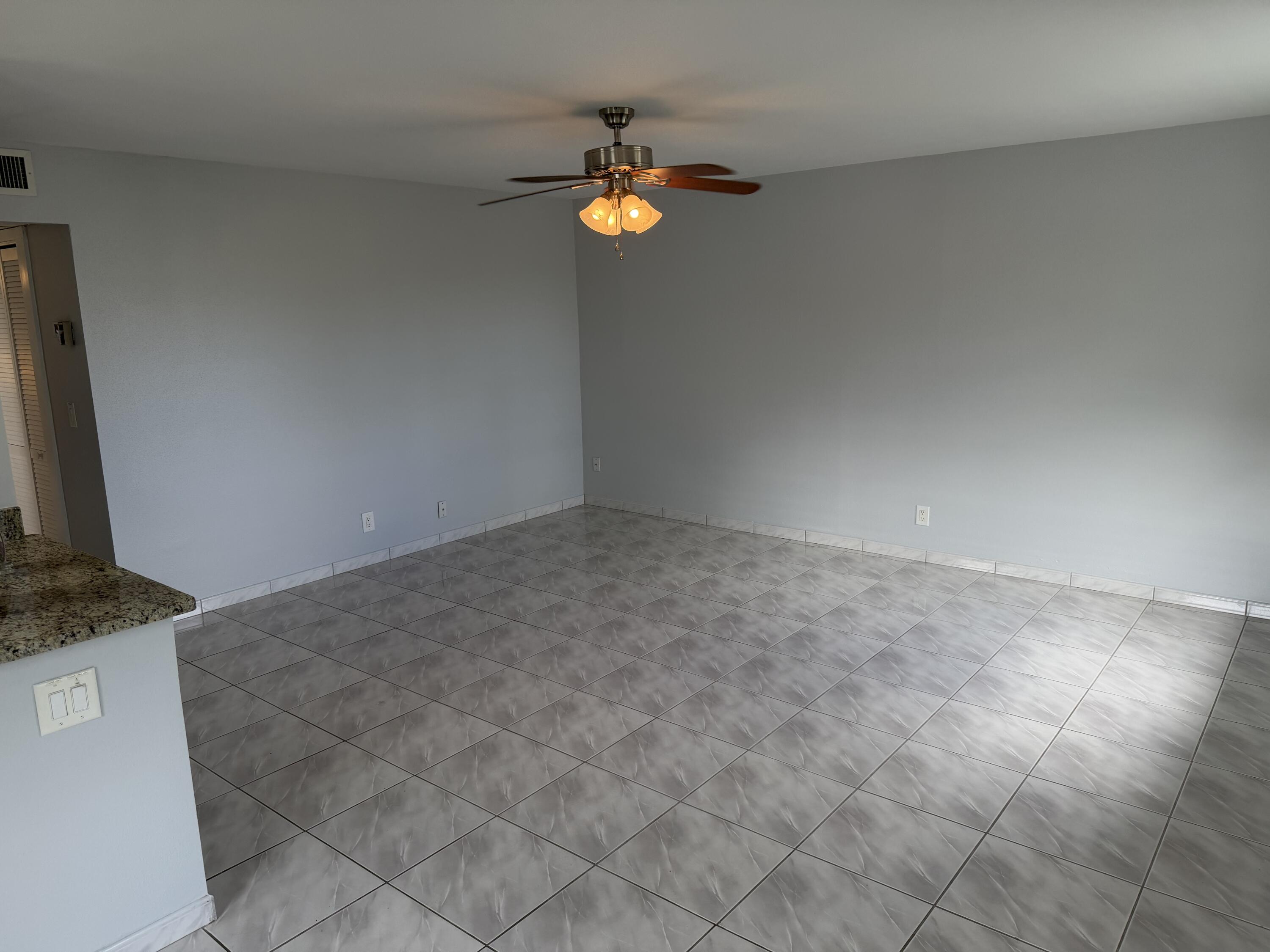 373 Monaco Way, Unit H Delray Beach, FL 33446 - Photo 9 of 9 a view of washer and dryer