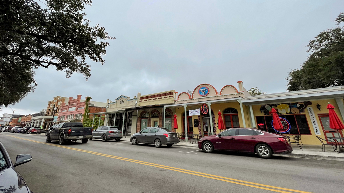 204 Constanza Trail Bastrop, TX 78602 - Photo 19 of 22 a view of a cars parked in front of a building