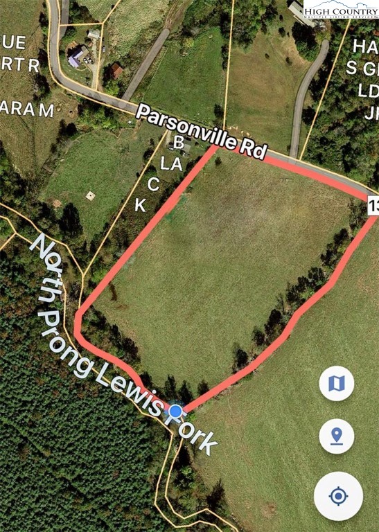 1761 Parsonville Road Purlear, NC 28665 - Photo 7 of 24 an aerial view of a tennis court
