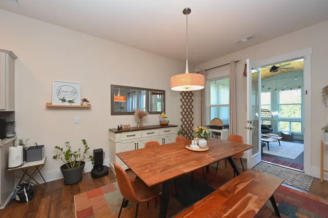 a kitchen with granite countertop a sink and a stove