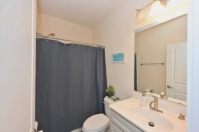a view of a chairs and table in the patio