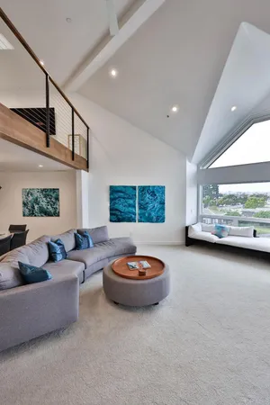 a living room with furniture and a window