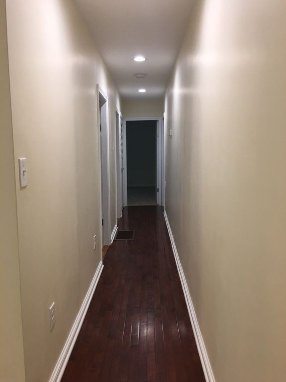 154 New Boston Road Sturbridge, MA 01566 - Photo 19 of 29 a view of hallway with wooden floor