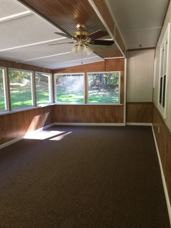 154 New Boston Road Sturbridge, MA 01566 - Photo 8 of 29 a view of room with window and a ceiling fan