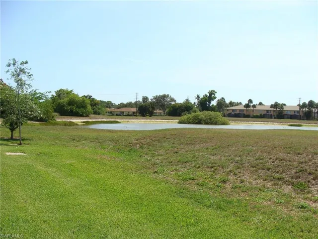 a view of front of house with a yard