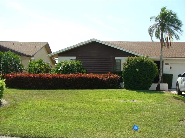 front view of house with a yard