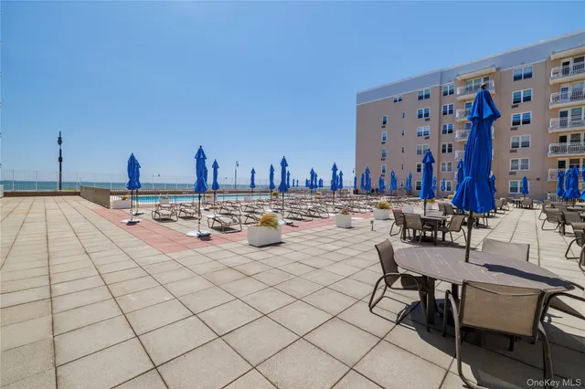 a view of a terrace with chairs