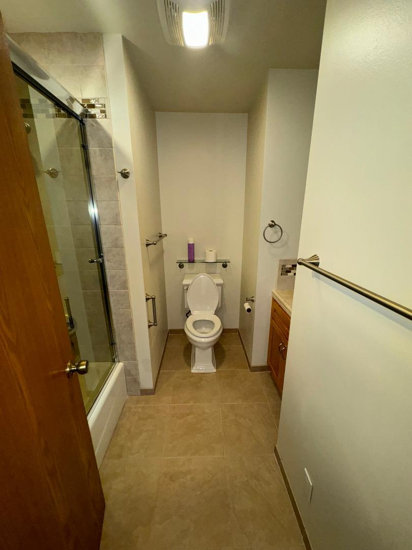 451 Corral De Tierra Road Salinas, CA 93908 - Photo 24 of 55 a bathroom with a sink a toilet and shower