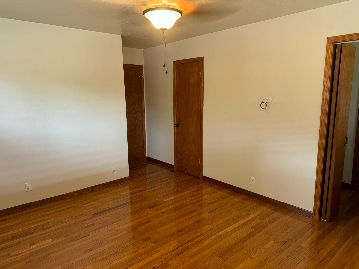 451 Corral De Tierra Road Salinas, CA 93908 - Photo 31 of 55 a view of an empty room with wooden floor and closet
