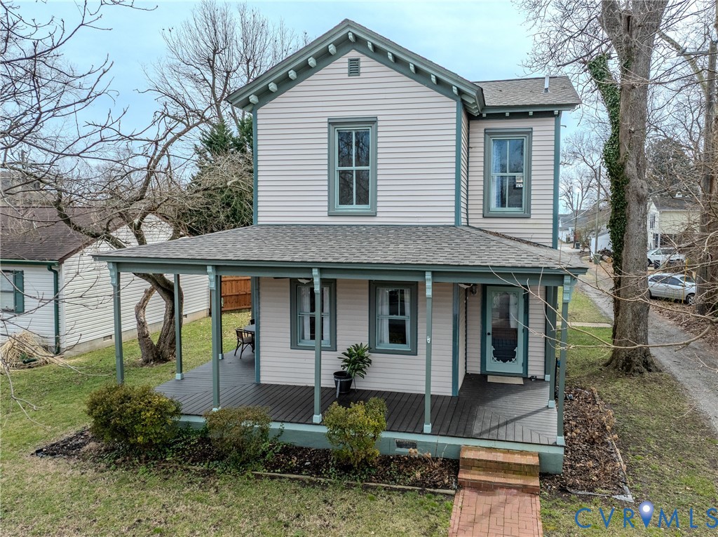 418 4th Street West Point, VA 23181 - Photo 32 of 36 a front view of a house with garden