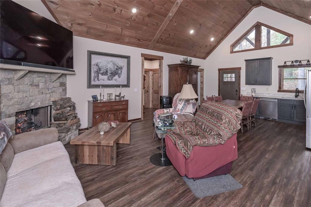 110 Ridge Crest Court Ellijay, GA 30540 - Photo 21 of 33 a living room with furniture and a fireplace