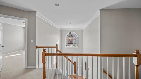 a view of a hallway with windows