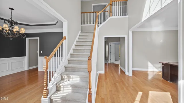 an aerial view of a house with a ocean view
