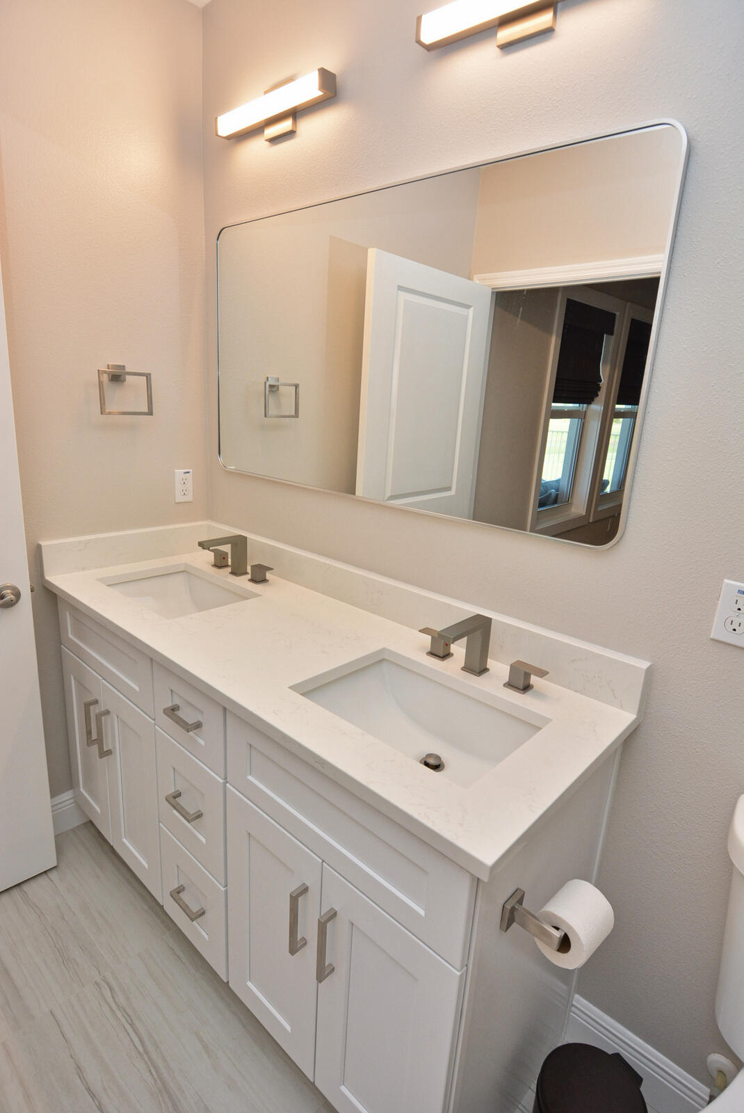 3524 Carriage Pointe Circle Fort Pierce, FL 34981 - Photo 15 of 55 a bathroom with a sink vanity and mirror