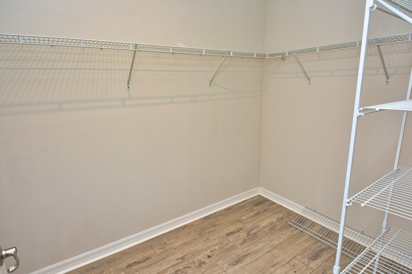 3524 Carriage Pointe Circle Fort Pierce, FL 34981 - Photo 21 of 55 a view of a room with racks on the wall