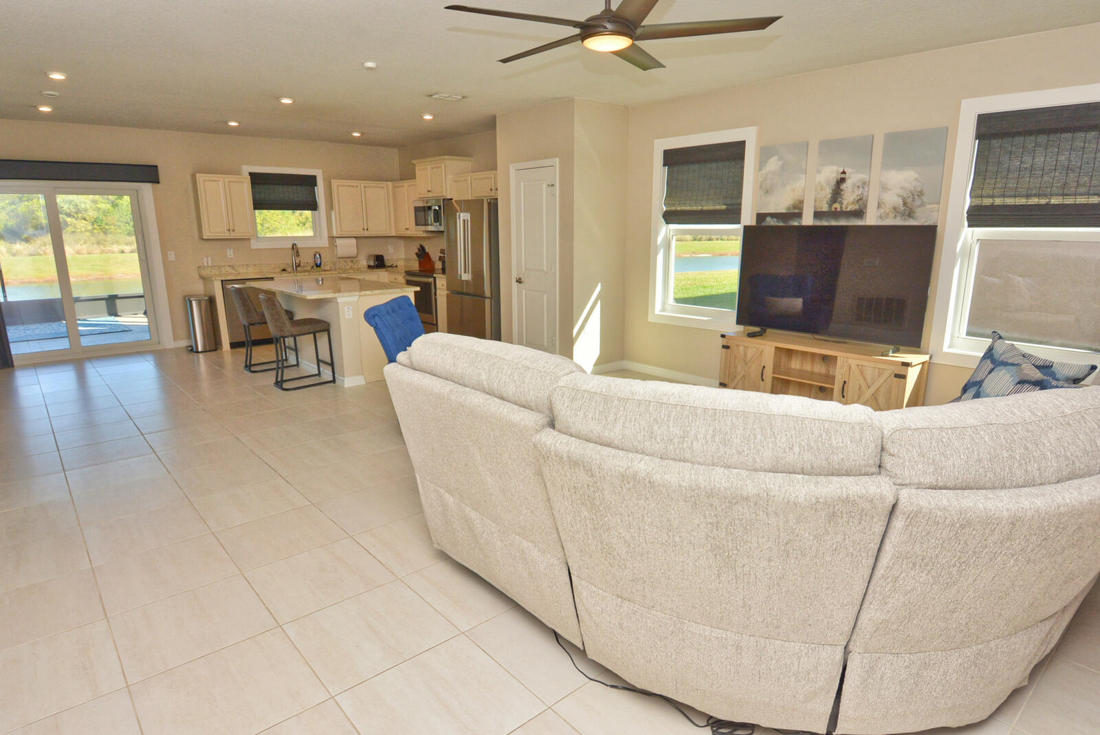 3524 Carriage Pointe Circle Fort Pierce, FL 34981 - Photo 29 of 55 a living room with furniture and a flat screen tv