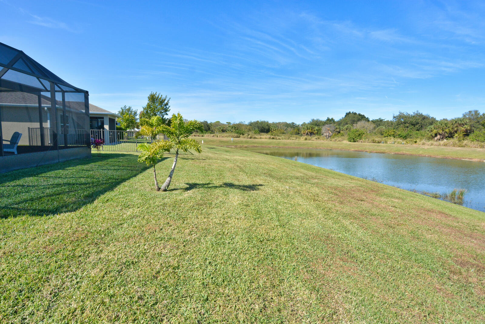 3524 Carriage Pointe Circle Fort Pierce, FL 34981 - Photo 41 of 55 a view of a lake with a big yard
