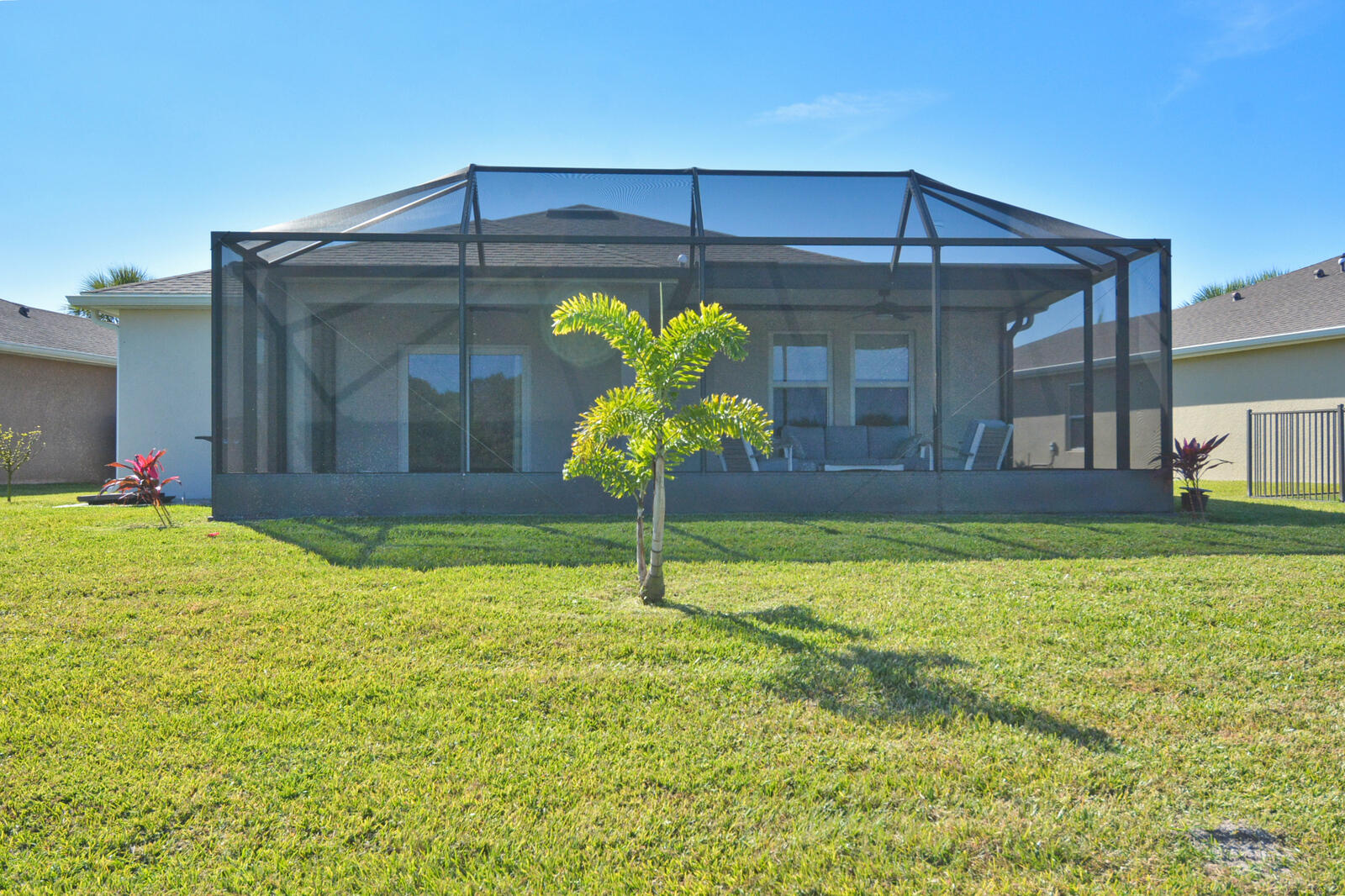 3524 Carriage Pointe Circle Fort Pierce, FL 34981 - Photo 43 of 55 a house view with swimming pool in front of it