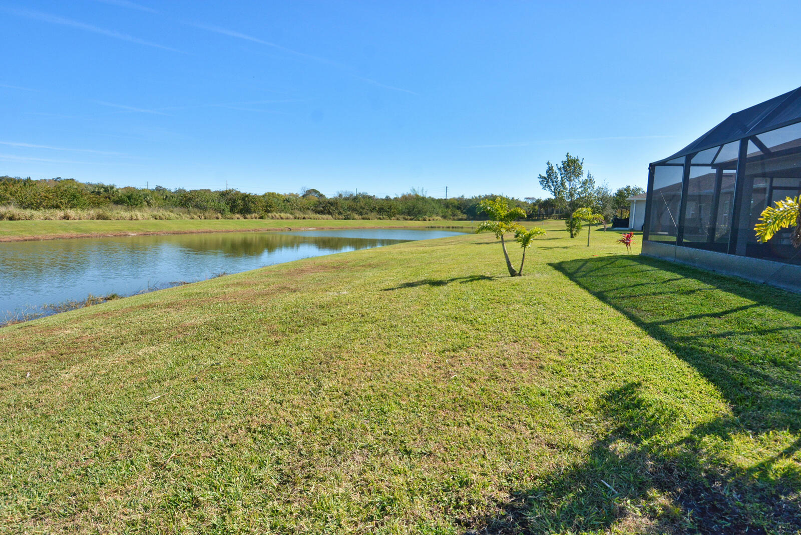 3524 Carriage Pointe Circle Fort Pierce, FL 34981 - Photo 44 of 55 a view of a lake with a big yard