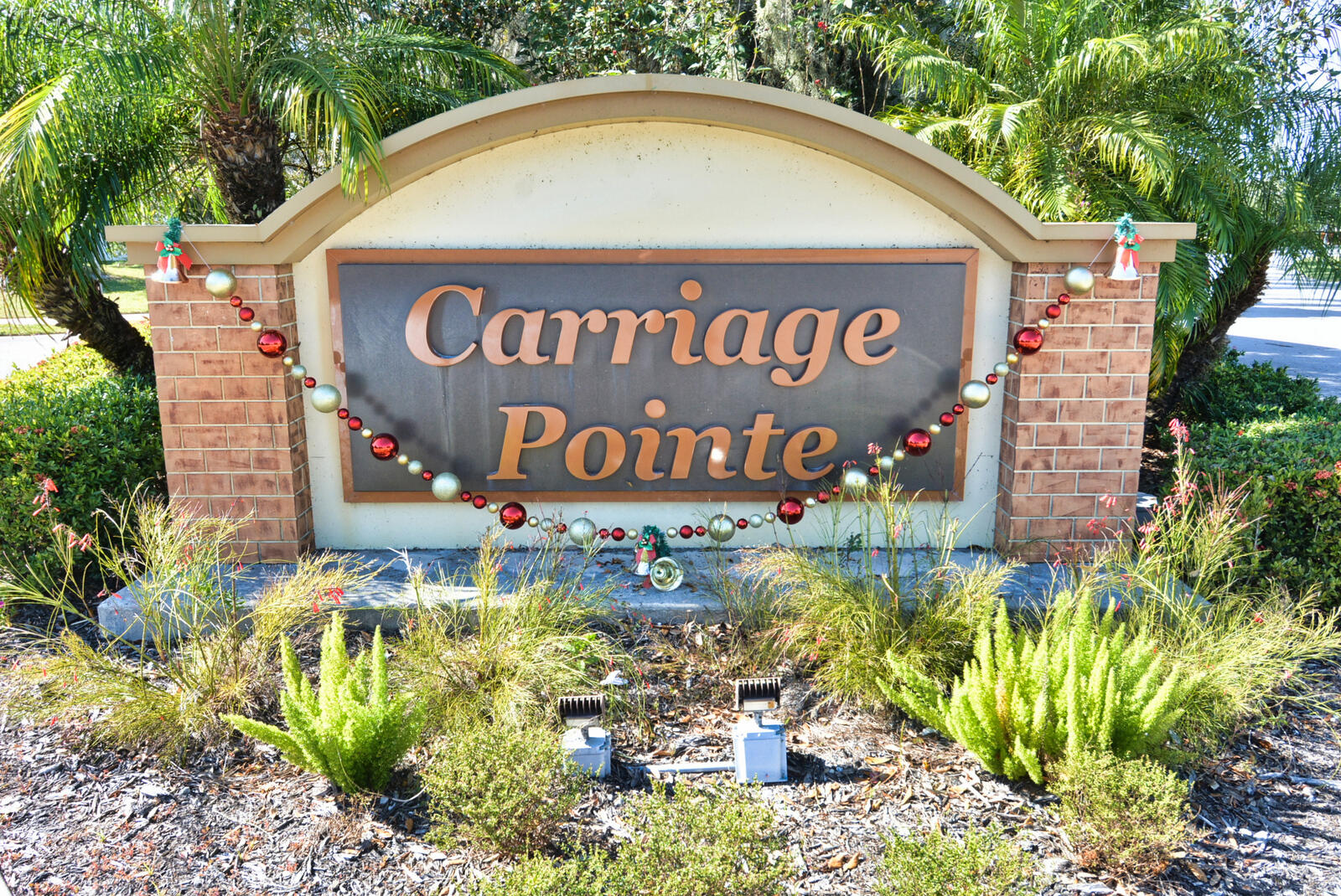 3524 Carriage Pointe Circle Fort Pierce, FL 34981 - Photo 6 of 55 a sign on the side of the road