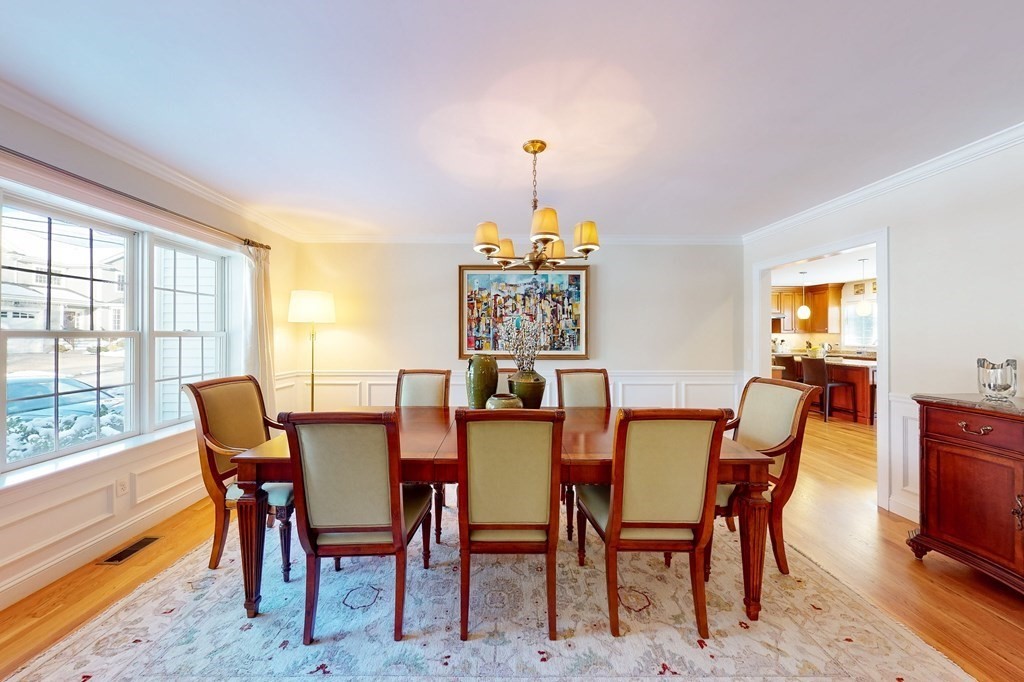94 Arch Street Needham, MA 02492 - Photo 3 of 23 a view of a dining room with furniture window and outside view