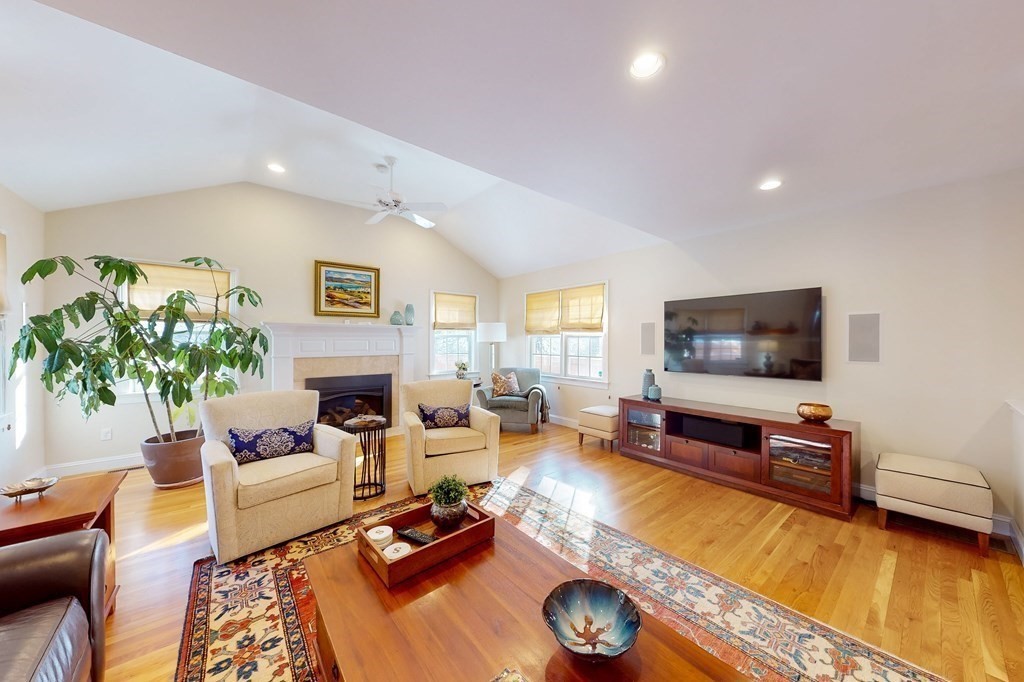 94 Arch Street Needham, MA 02492 - Photo 8 of 23 a living room with furniture and a flat screen tv