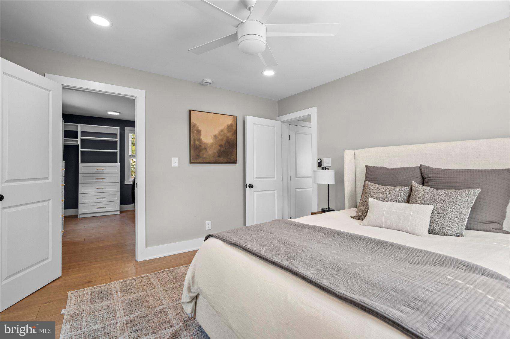 510 Overcrest Road Towson, MD 21286 - Photo 20 of 47 a bedroom with a large bed and a chandelier